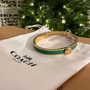 NWT! Coach enamel hinge bangle bracelet in green & gold + jewelry bag! Authentic